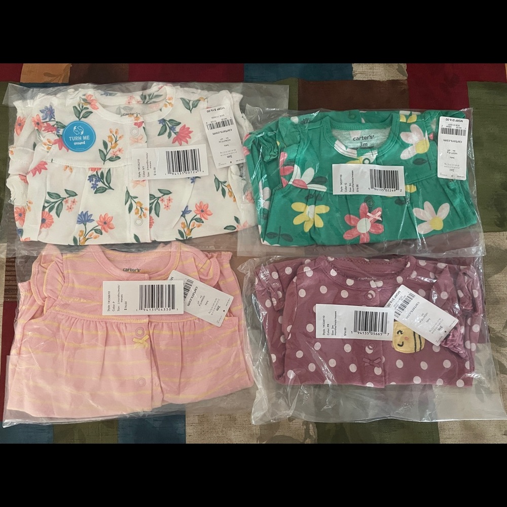 4 pack of Carter’s baby girl Rompers size 3 months Discontinued